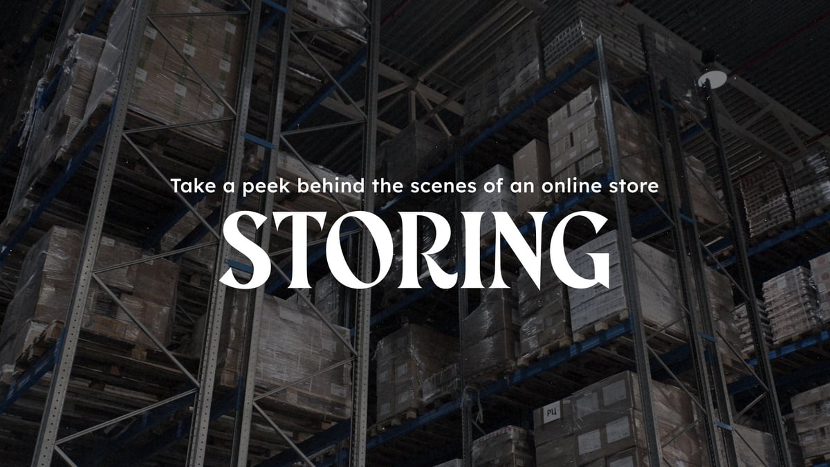 In the background, high storage shelves full of food. In the foreground there is the text