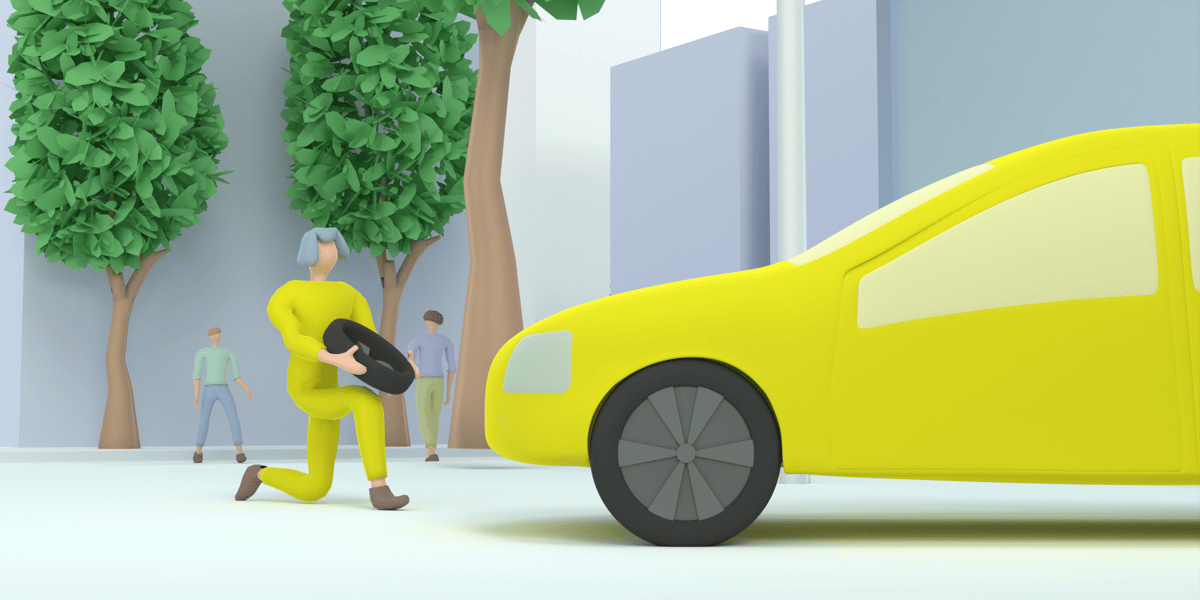 Mies suunnittelee renkaanvaihtoa keltaiseen autoon.