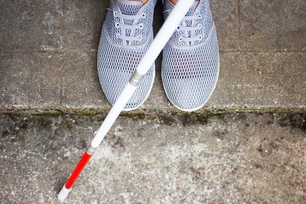 feet and red white stick